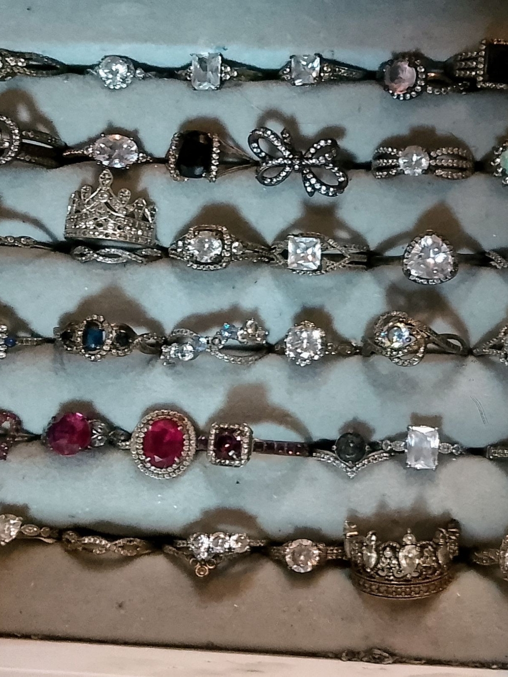 Vintage-Inspired Silver Ring Stack with Pink and Clear Gemstones